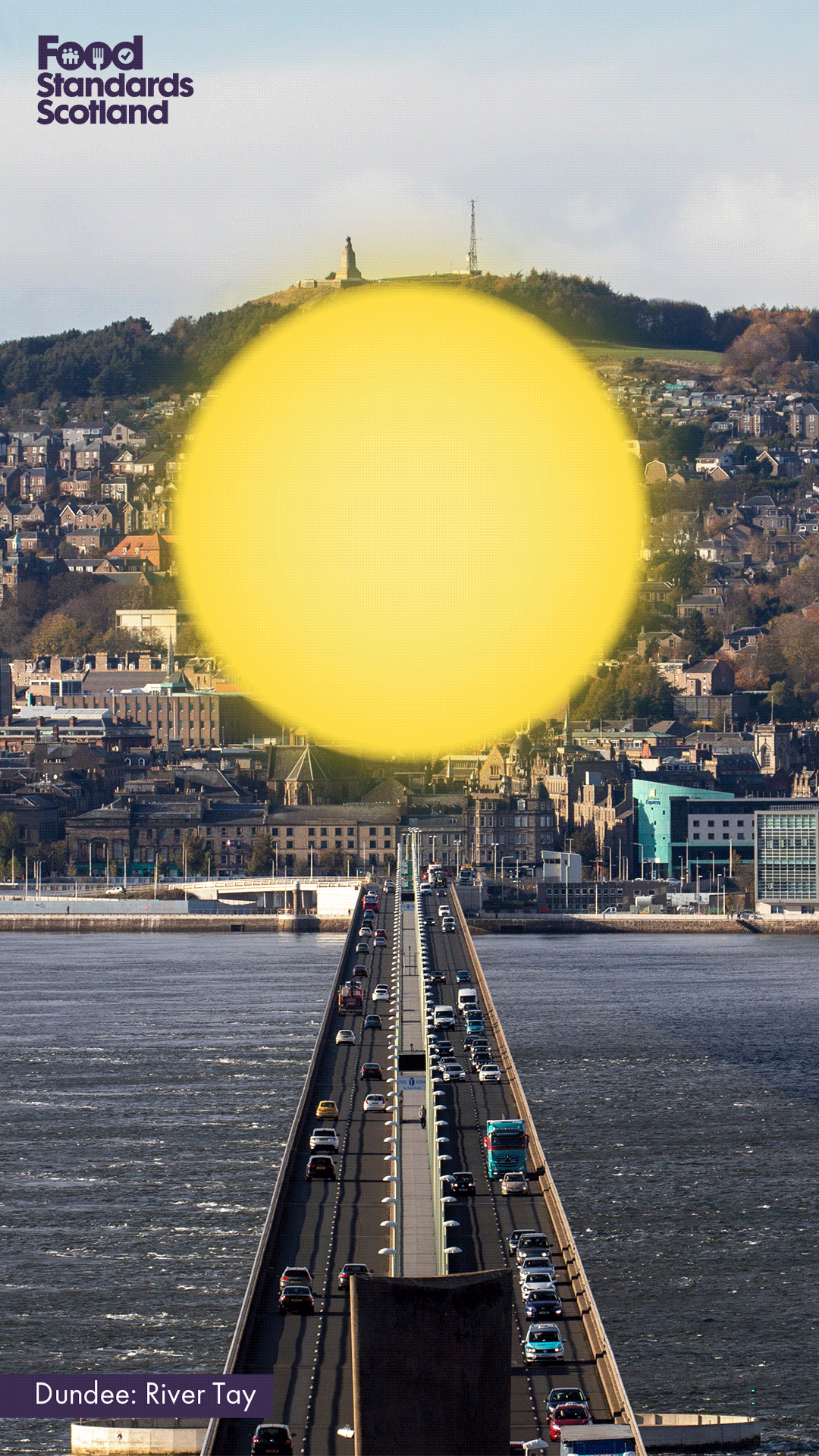 View of the Tay Bridge in Dundee with the sun shining over the top