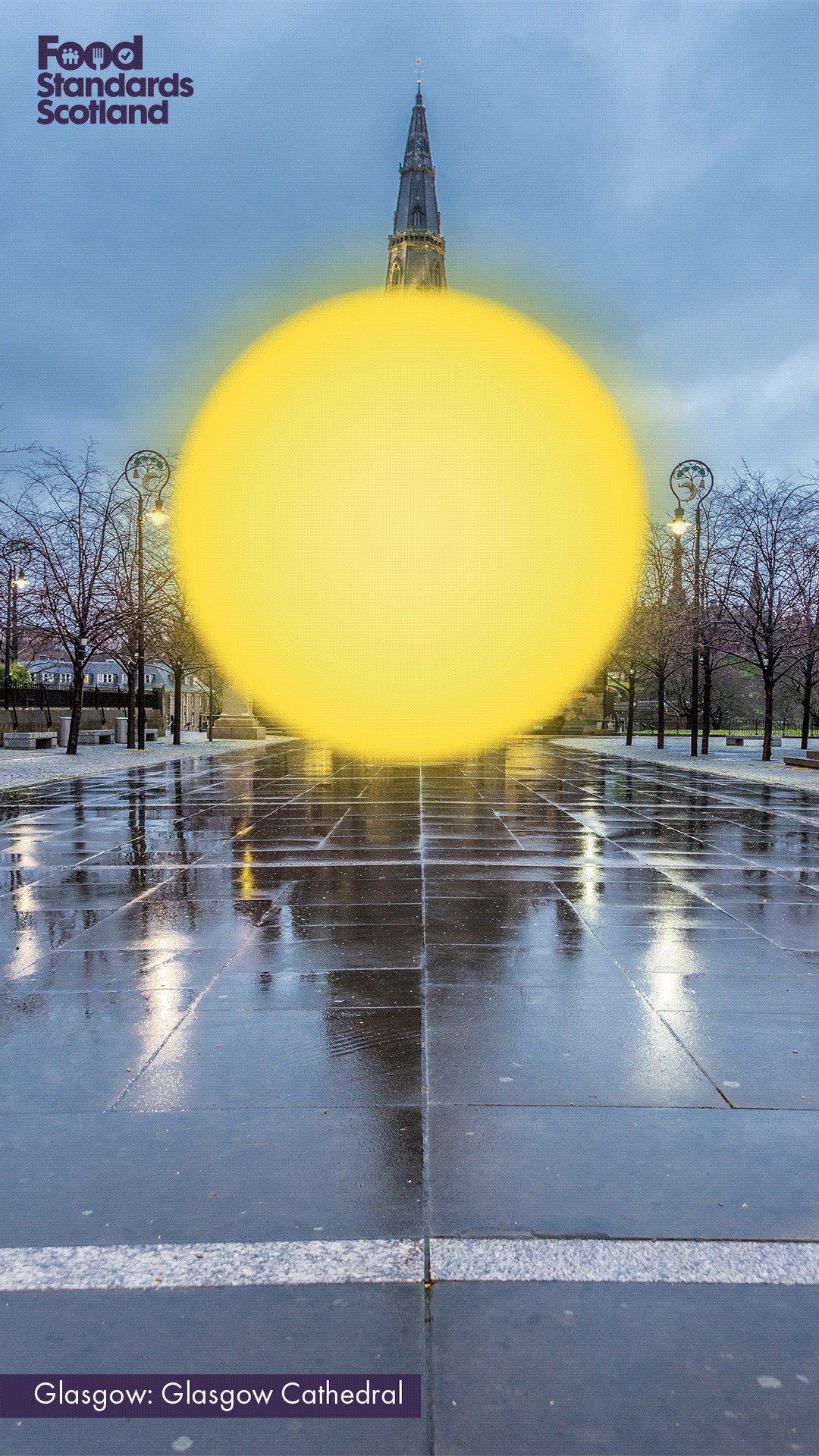 Dark image of glasgow with the sun shining