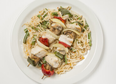 Grilled chicken and vegetable skewers with sweet chilli stir fry noodles