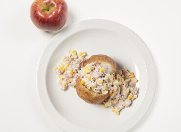Baked Potato with tuna and sweetcorn mayonnaise filling and an apple