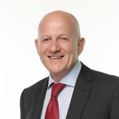 Headshot of Denis Treacy, CEO of Culture Compass